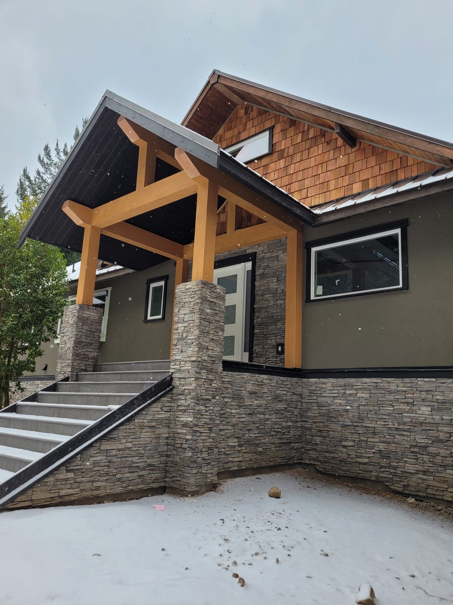 Substantial addition — timber frame structure, stone cladding and integration into existing residence