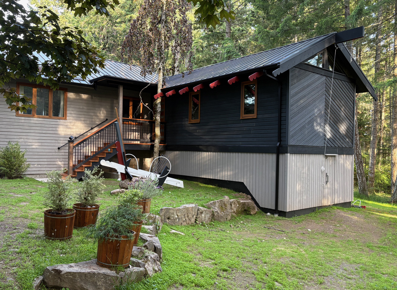 Finished primary suite and entry addition integrated with the existing home