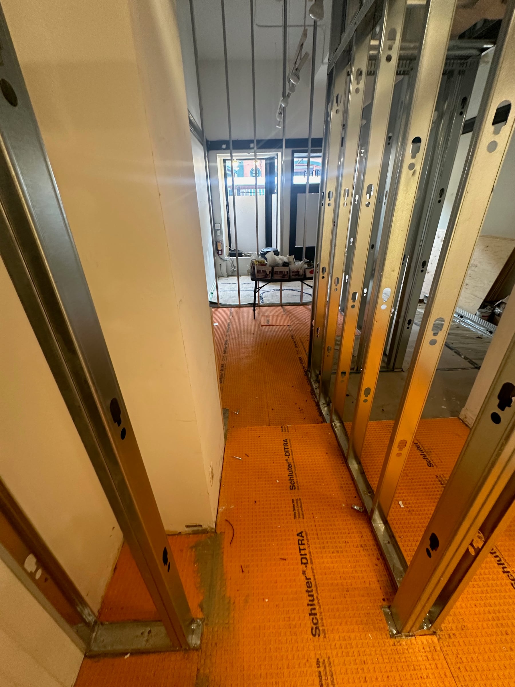 New wet-area construction and interior framing during the build