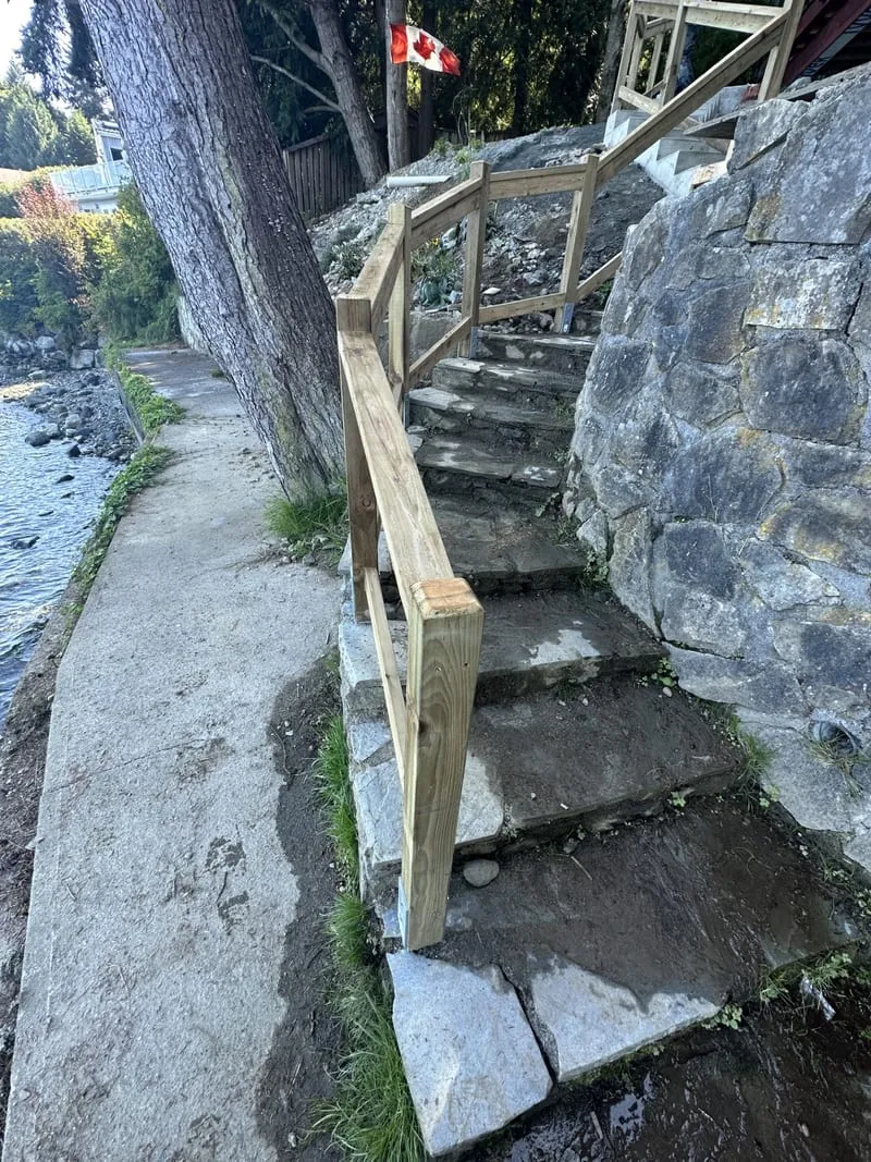 Custom coastal stair system — cedar stairs to ocean access