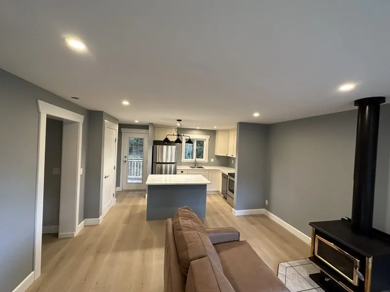 Character home renovation — open-plan kitchen and living room