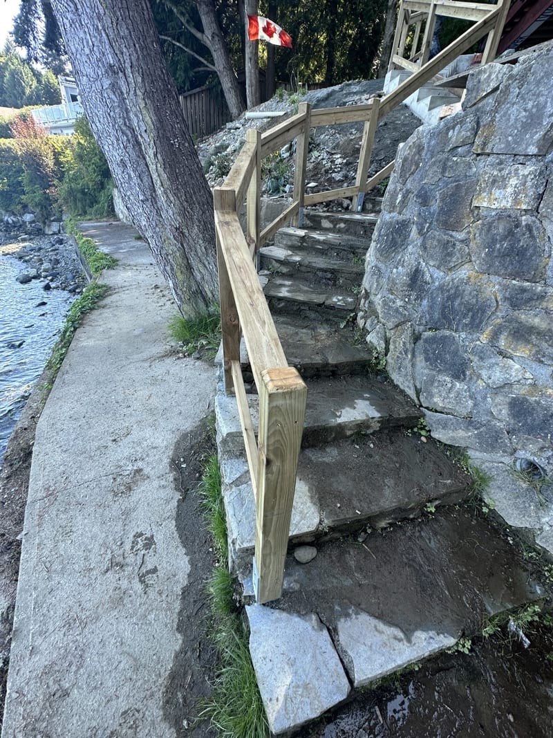 Custom coastal stair system — cedar stairs to ocean access