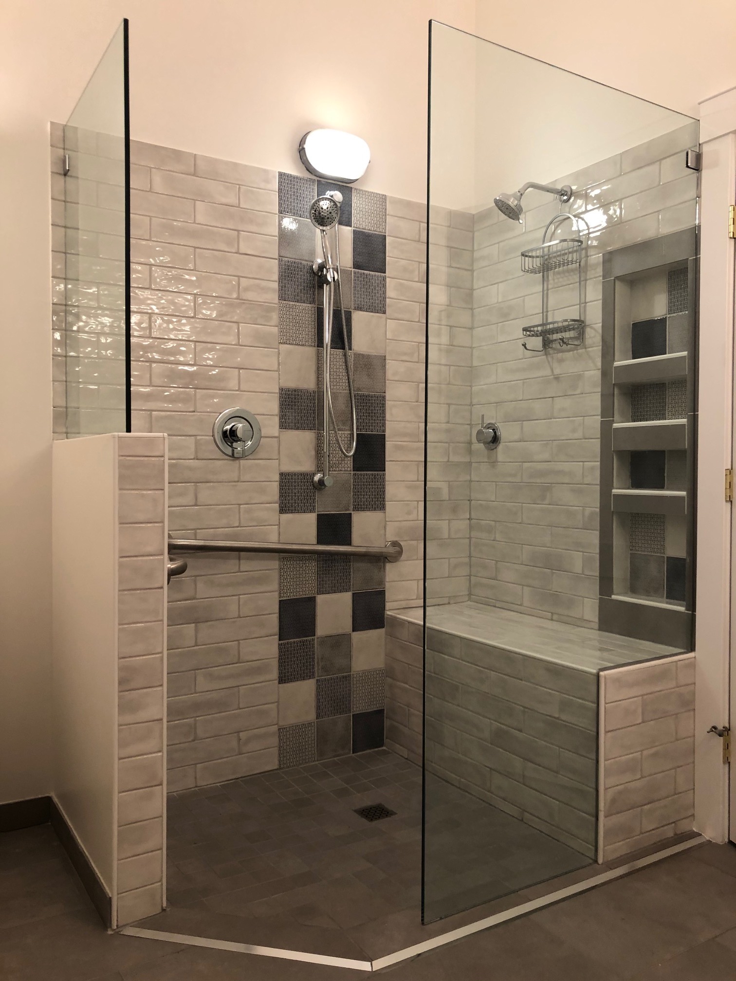 Fitted dressing storage beside coordinated bathroom interior